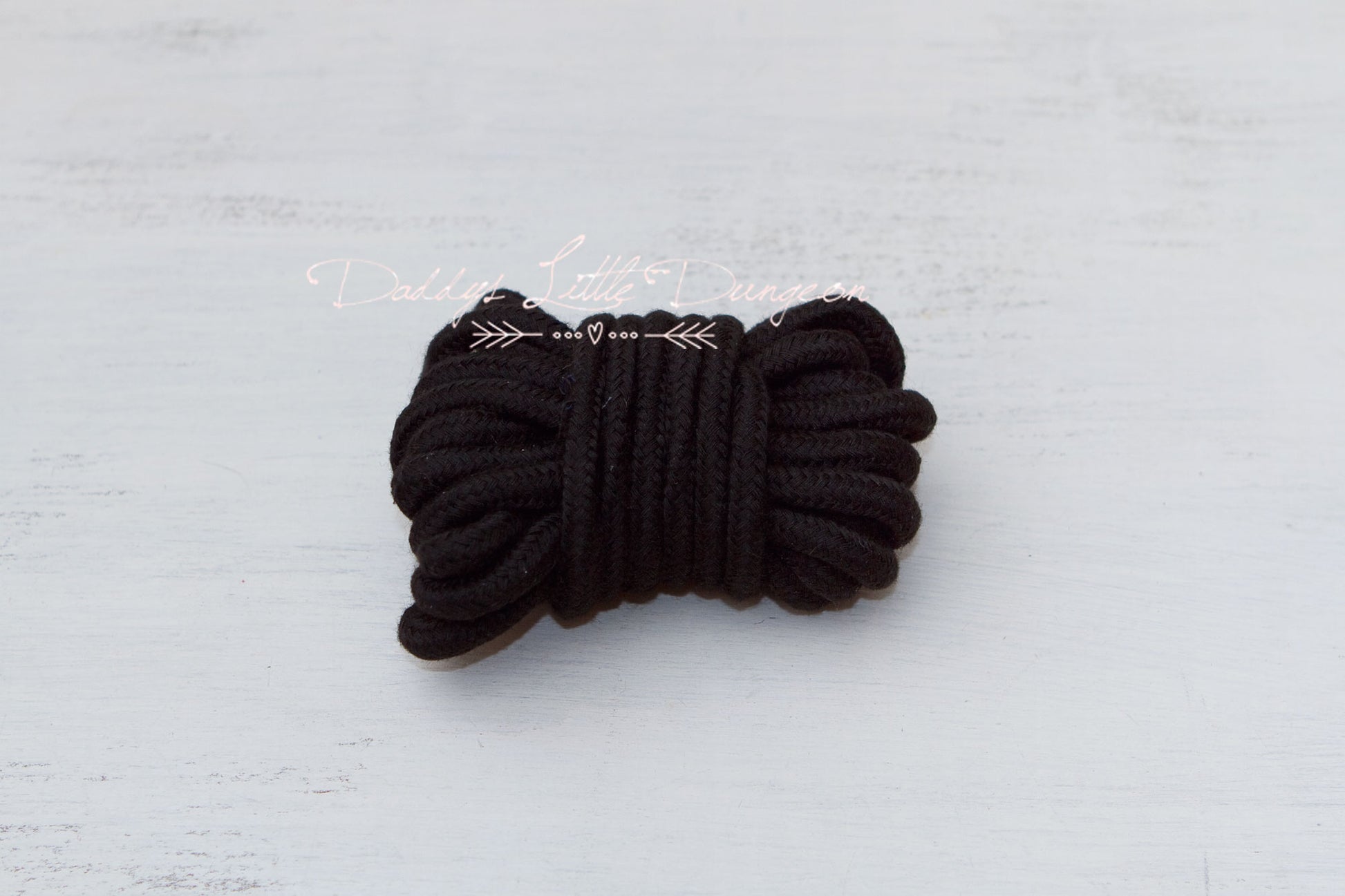 Goth Black BDSM rope for bondage, rope bunny, pet play, petplay, DDLG, and shibari.